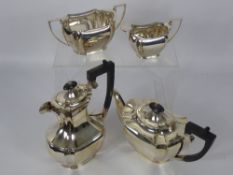 An Art Deco Silver Plated Tea and Coffee Set, comprising tea pot, coffee pot, sugar bowl and milk