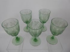 Five Victorian Green Wine Glasses, with acid etching depicting vine.