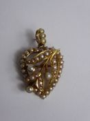 A Lady's Antique 14-15 ct Yellow Gold and Seed Pearl Heart Shaped Pendant Brooch, approx 4.5 gms.