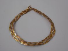 A Lady's 18 ct Tri-Gold Bracelet, approx 2.9 gms