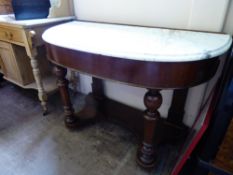 A Victorian Mahogany Duchess Dresser. The dresser having a white marble top, shelf beneath, approx