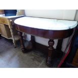 A Victorian Mahogany Duchess Dresser. The dresser having a white marble top, shelf beneath, approx