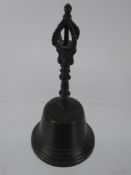 A Tibetan Style Bronzed Hand-Bell, approx 20 cms.