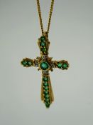 A 9ct Yellow Gold Diamond and Emerald Crucifix Pendant, 2 - 3 pts dias, centre emerald 3 mm and 14 x