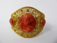 An Antique 18 / 22 ct Yellow Gold and Coral Bracelet, the wire-form double-hinged beaded bracelet