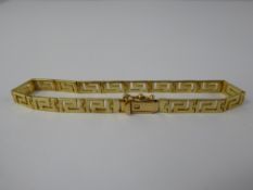 A Lady's 15 ct Yellow Gold Greek Key Design Bracelet, approx 11 gms.