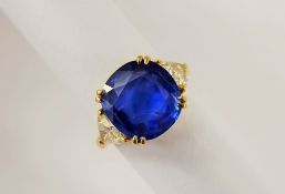 A 5.95 ct Vivid Cornflower Blue Natural Non - Heat -Treated Ceylon Sapphire and Diamond Ring, the