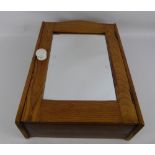 A Vintage Oak Mirror-Fronted Wall Cabinet, together with a mahogany wall sconce. (2)