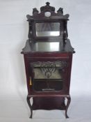 A Victorian Mahogany Mirrored Display Cabinet. The cabinet having galleried top with mirrored