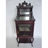 A Victorian Mahogany Mirrored Display Cabinet. The cabinet having galleried top with mirrored