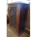 A Vintage Oak Carved Cupboard. The cupboard having two shelves with carved single door and