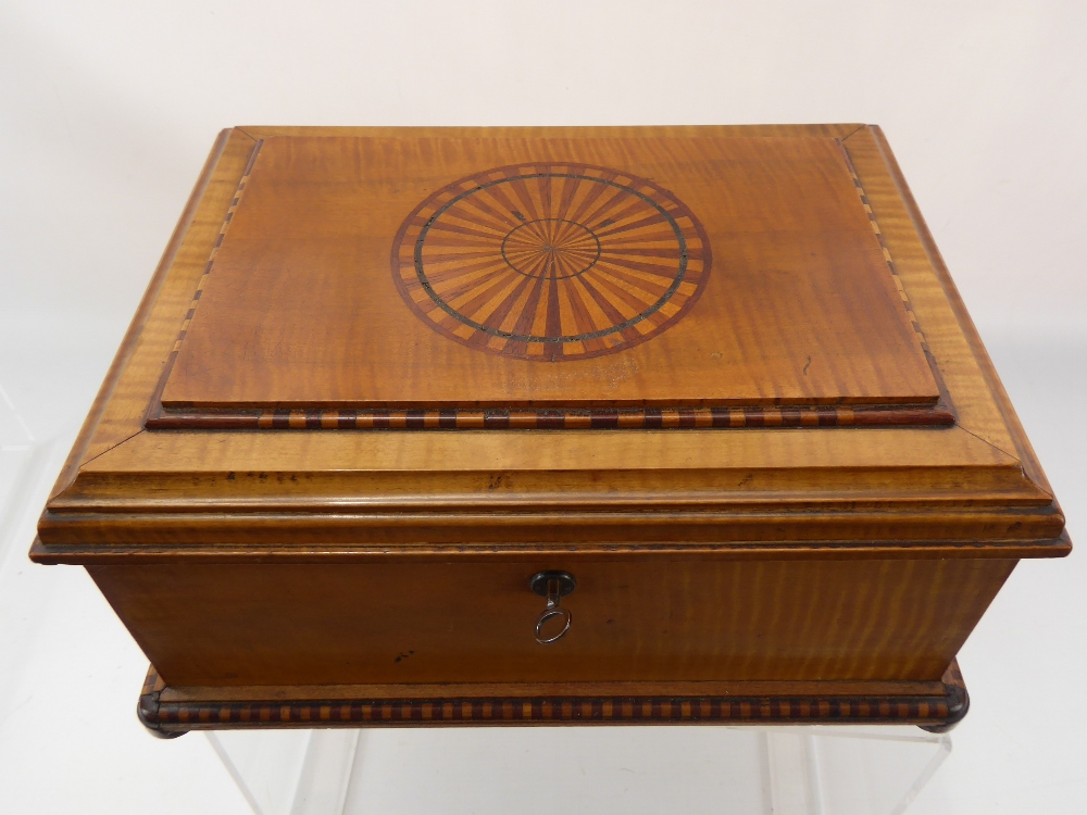 A Satin Wood Stationery Box with marquetry to lid and base, approx 30 x 23 x 15 cms, with key.