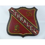 A Vintage 'Thrales Streatham' Grammar School House Shield, with label to verso, approx 37 x 40 cms.