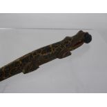A Wood Carved Letter Opener, depicting a crocodile swallowing a man, approx 30 cms together with a