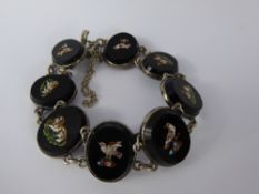 An Antique Continental Silver and Micro-Mosaic Bracelet, having eight oval cameos depicting