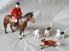 Beswick Huntsman Figure, depicting a fox and three hounds, (af).