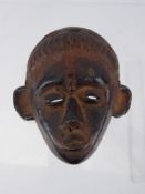 A West African Terracotta Mask, approx 13 x 12 cms