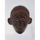 A West African Terracotta Mask, approx 13 x 12 cms