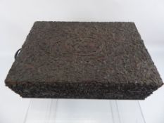 An Antique Indian Carved Wooden Sewing Box, the box having intricate carving to the lid and sides