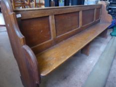 A Vintage Oak Church Pew. The pew having panelled back, approx 220 x 37 x 91 cms.