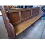 A Vintage Oak Church Pew. The pew having panelled back, approx 220 x 37 x 91 cms.