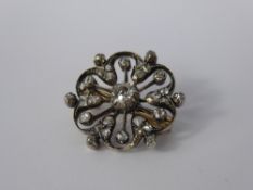 An Antique Yellow Gold and Silver Diamond Button Brooch, the brooch having a central old-cut diamond