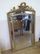 A 19th Century Gilt Wood Overmantle Mirror, with elaborate scrolling foliate frame, approx 150 x