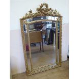 A 19th Century Gilt Wood Overmantle Mirror, with elaborate scrolling foliate frame, approx 150 x