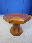 An Art Deco Octagonal Walnut Coffee Table, approx 56 cms dia., on sturdy central column on