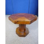 An Art Deco Octagonal Walnut Coffee Table, approx 56 cms dia., on sturdy central column on