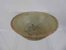 An Antique Oriental Cargo Blue and White Bowl, depicting flowers and leaves, approx 15 x 6 cms. (