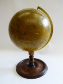 Malby 1877 Antique Terrestrial Globe, the globe mounted on a mahogany baluster base, marked 'Malby's