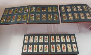 Eight Albums of Wills's Cigarette Cards, in a variety of subjects from African animals to . signs of