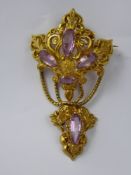 An 18 / 22 ct Antique Yellow Gold Continental Amethyst Baroque Style Double Drop Brooch, depicting