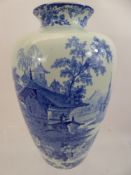 An Oriental Blue and White Porcelain Vase, depicting a charming river scene, approx 27 cms high.