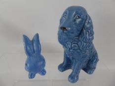 A Silver Sylvac Blue Spaniel, nr 1382, approx 19 cms high, together with two Sylvac style rabbits.