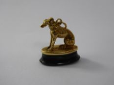 An Antique 18ct / 22 ct Yellow Gold Seal, in the form of a Greyhound, approx 5.8 gms (af)