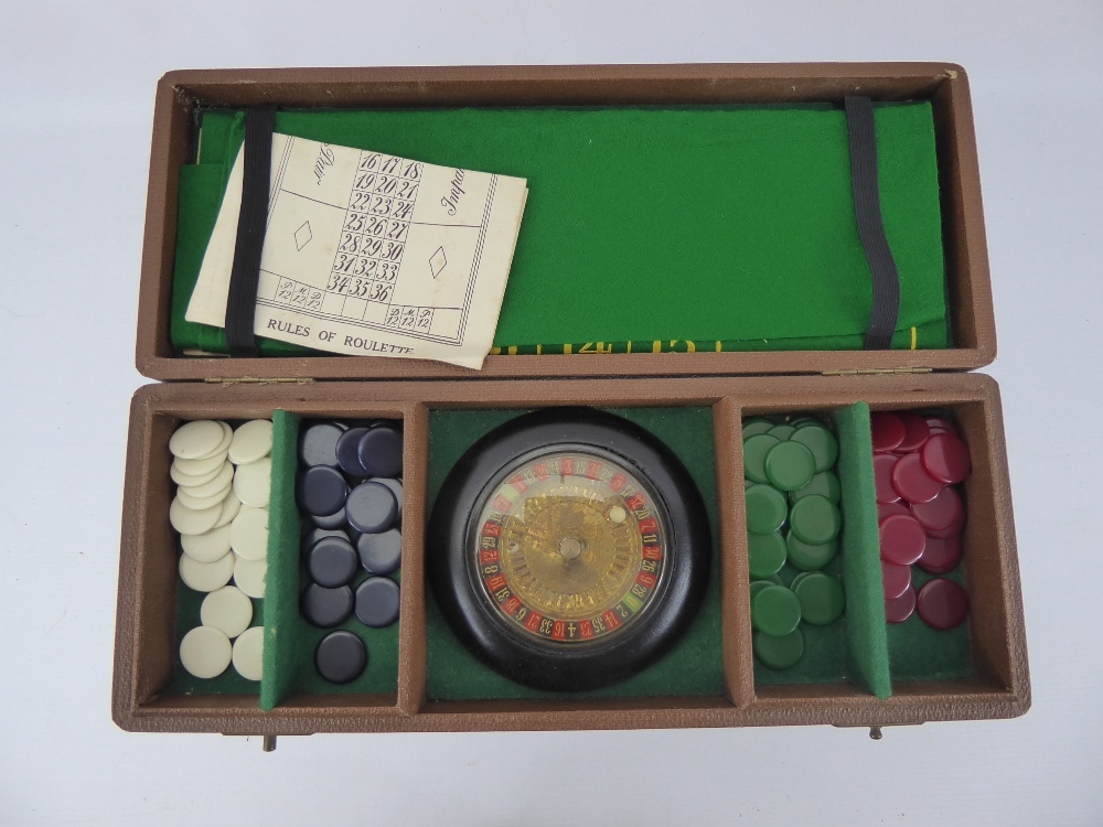 A Miniature Table Top Roulette Game, in the original box.