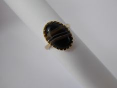 A Lady's 18 ct Yellow Gold Banded Agate Ring, agate 14 x 10 mm, size N, approx 4 gms