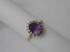 A 9 ct Yellow and White Gold Hallmarked, Amethyst and Diamond Ring, amethyst 9 x 7 mm, approx 16 x 8