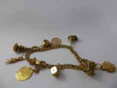 An Antique 18 ct Gold Hallmarked Charm Bracelet, the bracelet having eleven charms (some 14 and