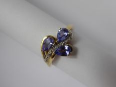 A Lady's 9 ct Yellow Gold Tanzanite Diamond Ring, set with three pear-shaped tanzanites, approx 1.23