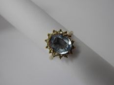 A 9ct Yellow Gold Hallmarked Blue Topaz Ring, the topaz 10 x 8 mm, size P, approx 3.8 gms.