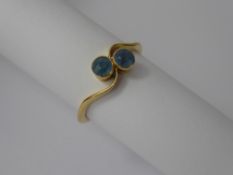 An 18 ct Yellow Gold Two Stone Topaz Ring, approx 2 x 4 mm, size O, approx 2.5 gms