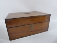 Three Boxes, including small mahogany tea caddy, small mahogany writing box and walnut silk-lined