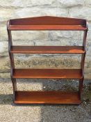 An Antique Mahogany Waterfall Book Case, the book case having four shelves, approx 64 X 75 18 cms.