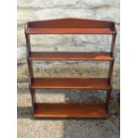 An Antique Mahogany Waterfall Book Case, the book case having four shelves, approx 64 X 75 18 cms.