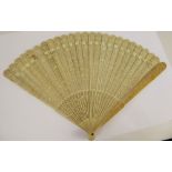 A Lady's 19th Century Ivory Delicate Brisé Fan, intricately carved with floral garlands, approx 25