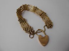 A 9ct Gold Gate Link Bracelet, the bracelet having patterned links, with heart-shaped clasp,