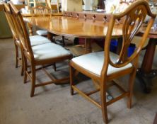 A Reproduction Twin Pedestal Regency Style Oval Dining Table, with swept feet and ball and claw